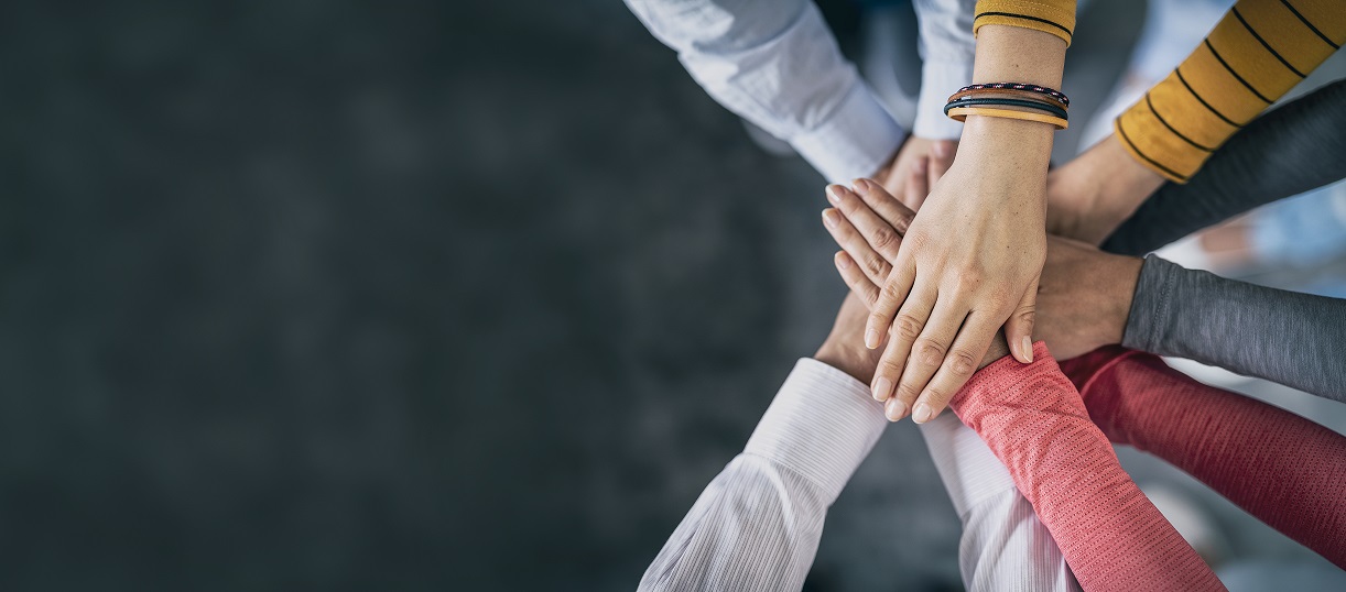 stacked hands for unity